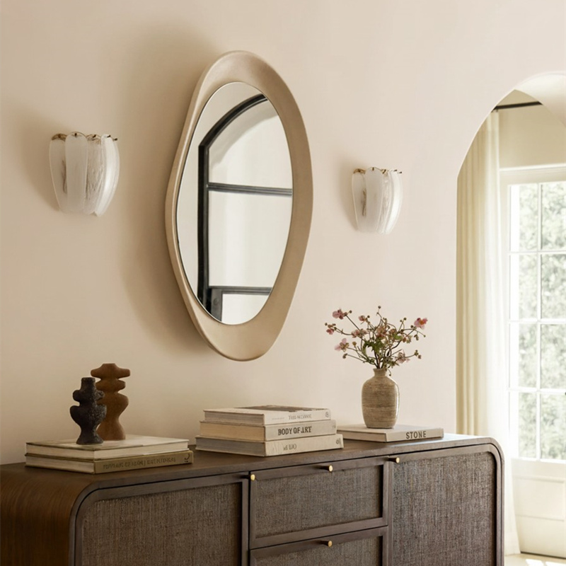 Velora wall lamps beside a mirror
