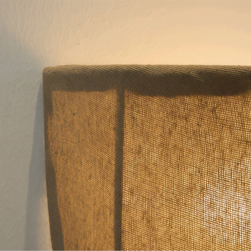 Illuminated close view of the linen shade