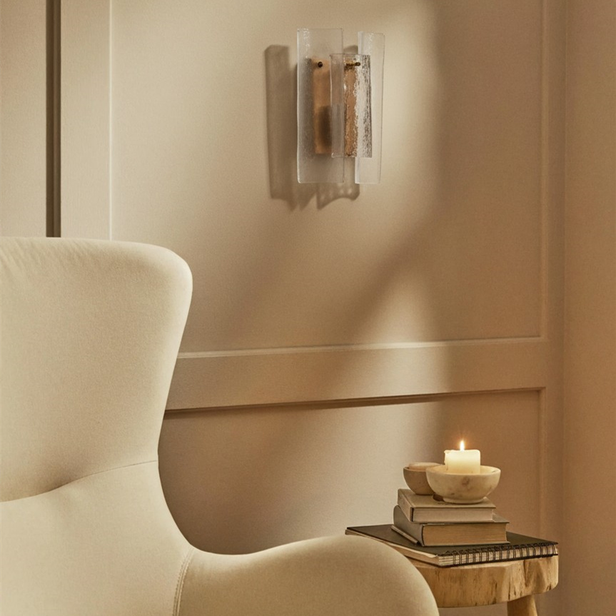 Customer seating area illuminated by the Velora wall sconce