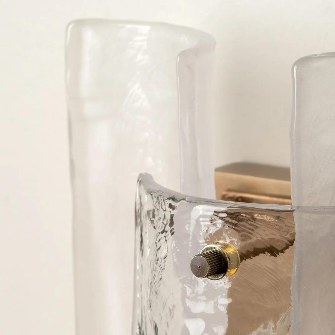 Close view of layered glass texture on the Velora wall sconce