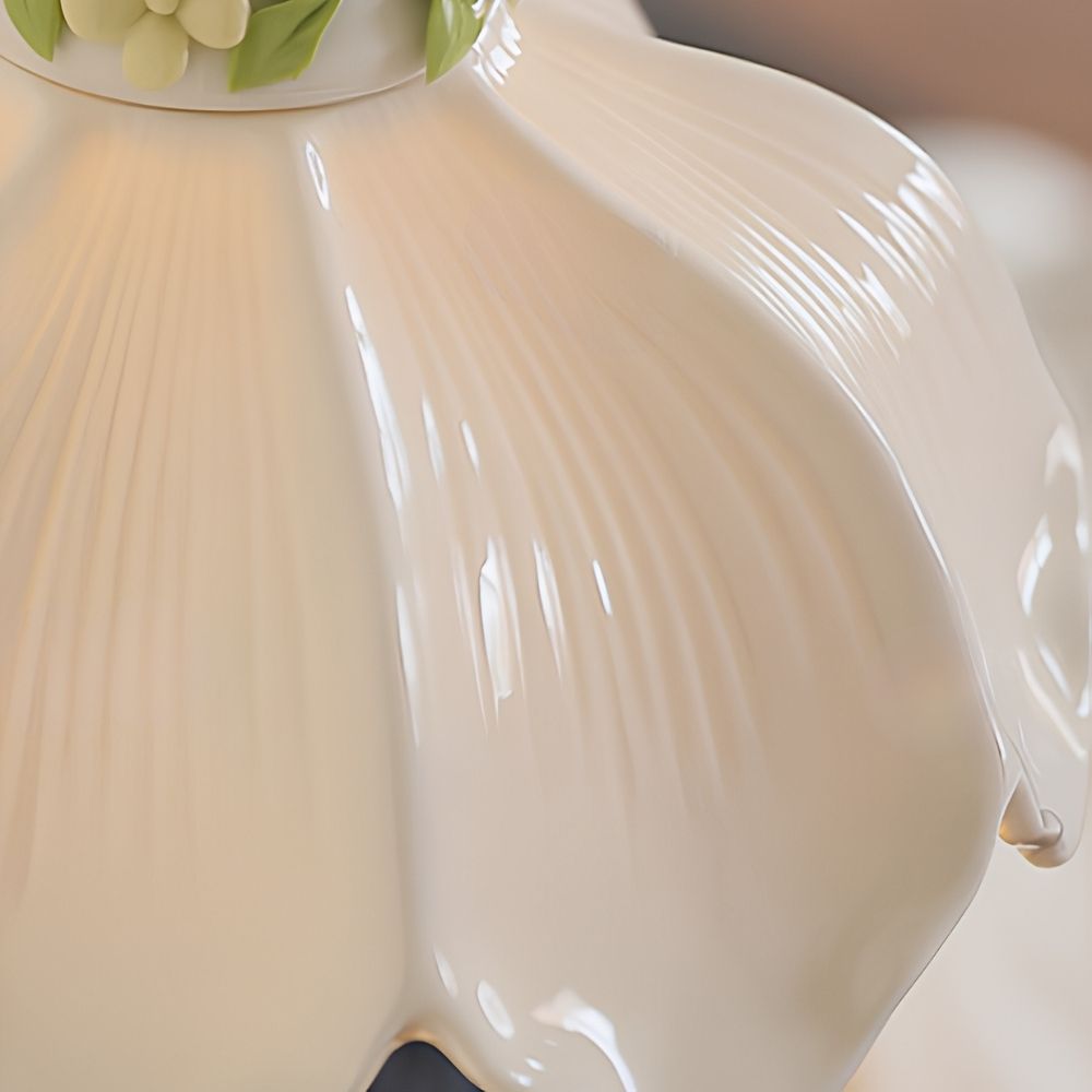 Close-up of glossy petal texture on the pendant shade
