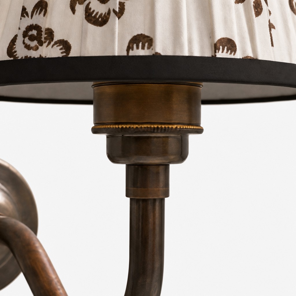 Close-up of the shade fitting and curved metal arm