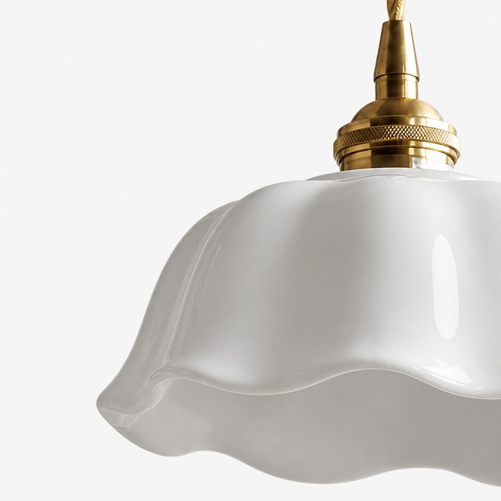 Close-up of the brass fitting above the flower ceramic shade