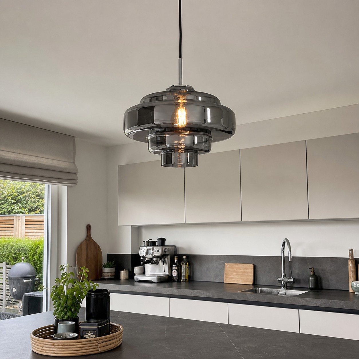 Retro glass pendant paired with modern flat-front cabinetry.