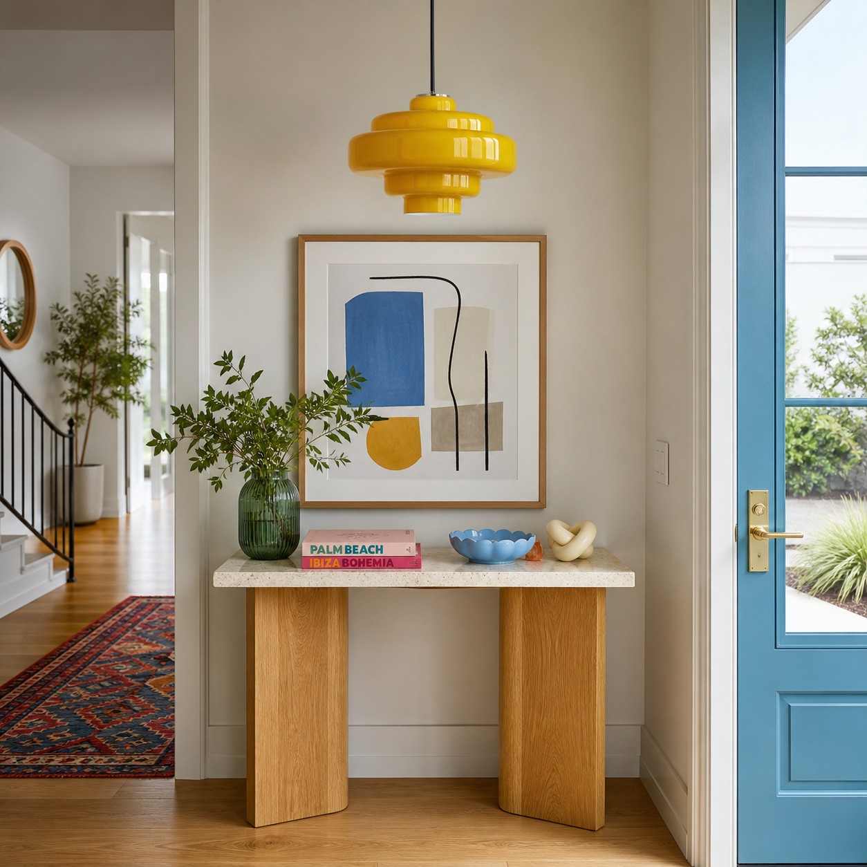 Retro glass hanging lamp illuminating a simple modern console table