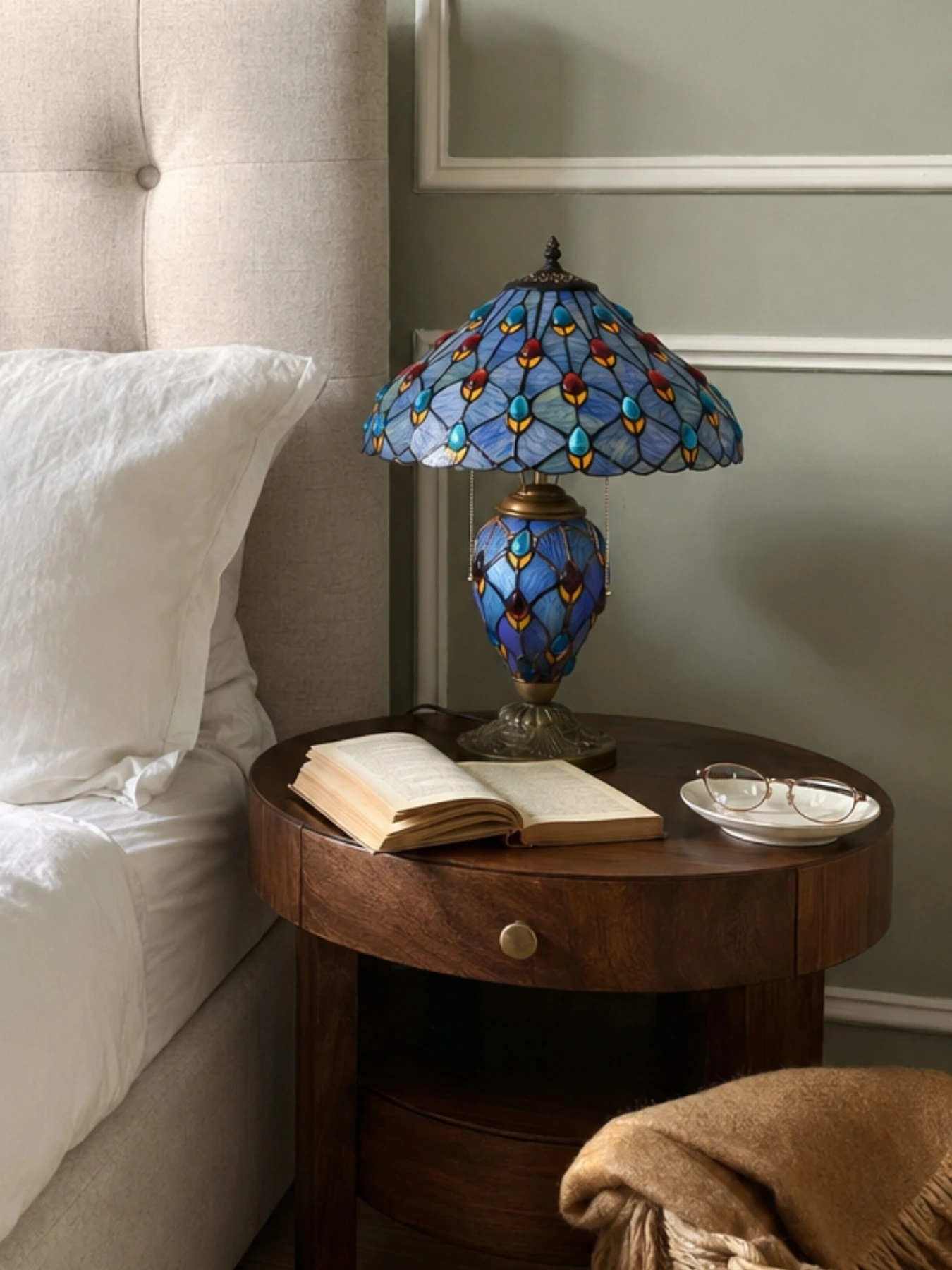 Tivanny table lamp on a side table beside a chair