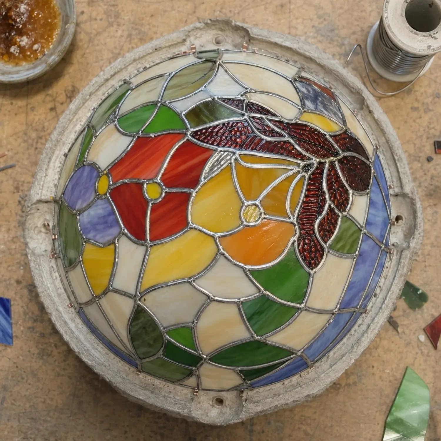 Hand-welded Tiffany-style stained glass shade in progress
