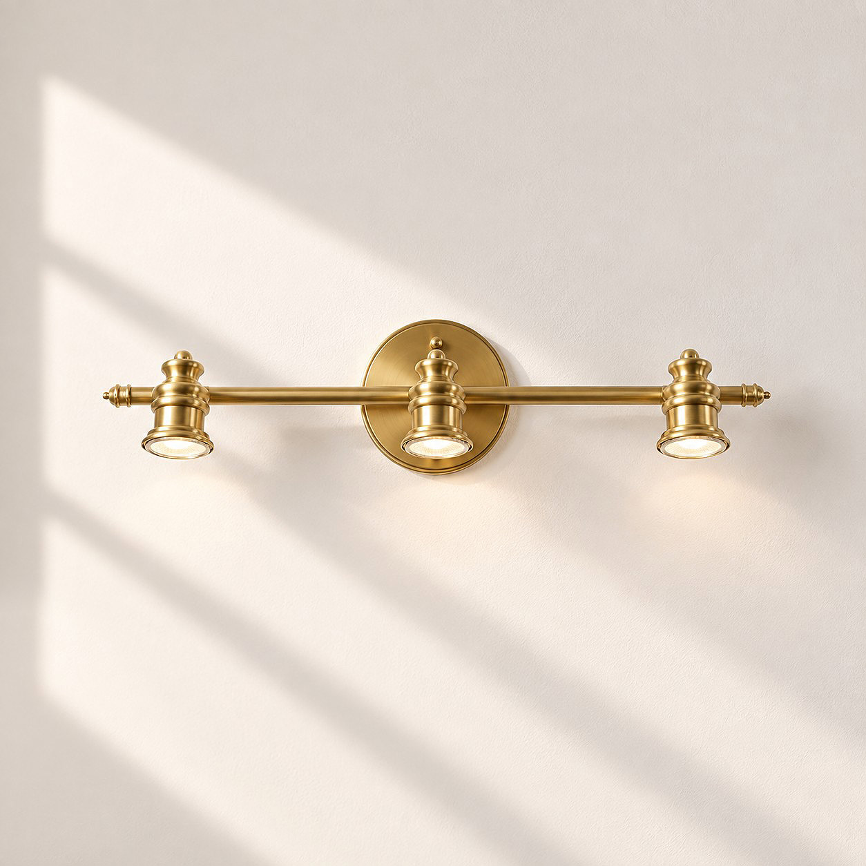 Aurelia Adjustable Natural Brass Wall Light | Sculpted Heads — A natural perspective