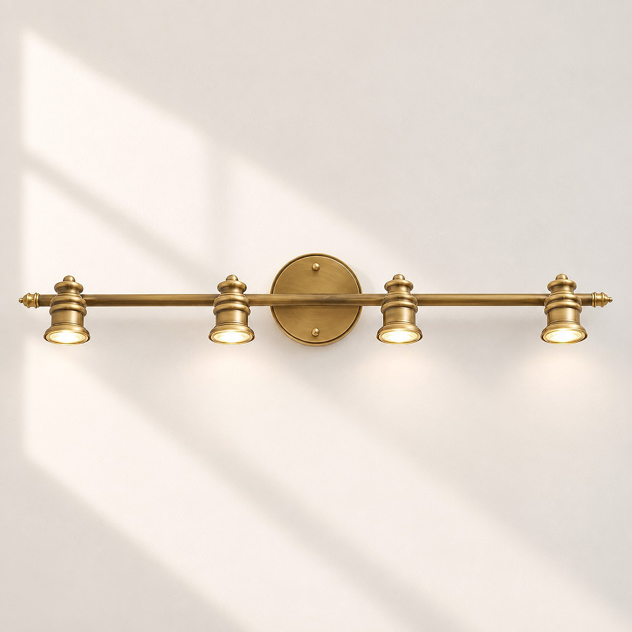 Aurelia Adjustable Natural Brass Wall Light | Sculpted Heads — A natural perspective