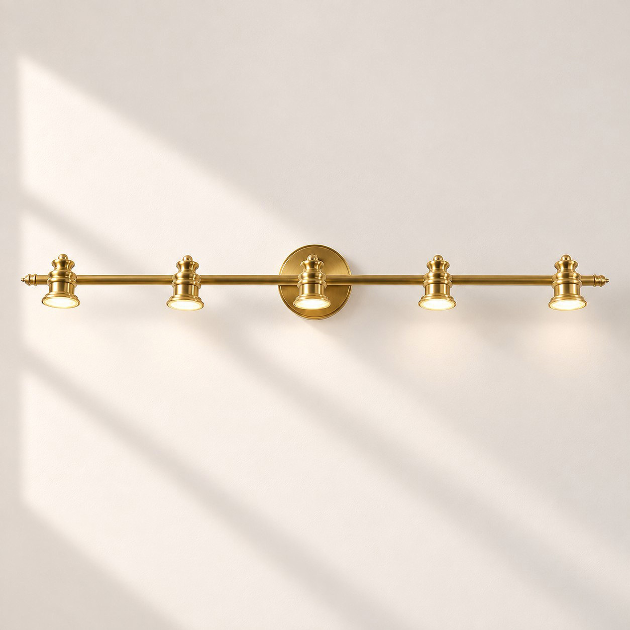 Aurelia Adjustable Natural Brass Wall Light | Sculpted Heads — A natural perspective