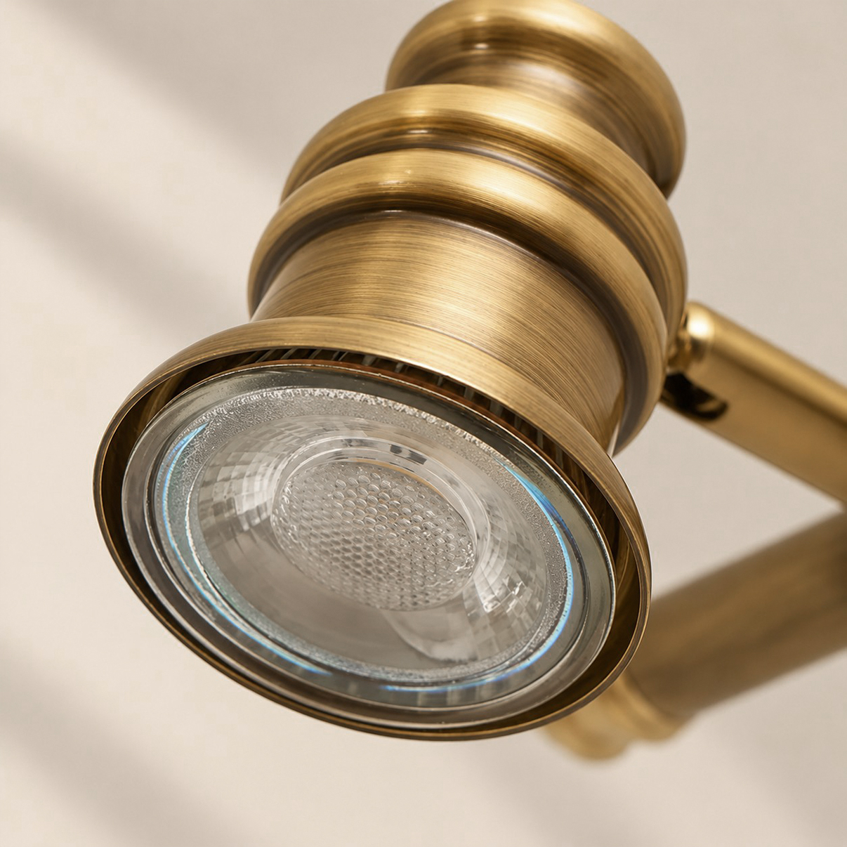 Aurelia Adjustable Natural Brass Wall Light | Sculpted Heads — A natural perspective