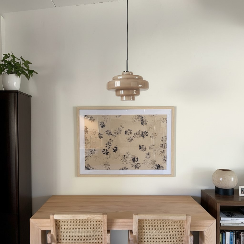 Customer photo showing Koloro pendant light over dining furniture