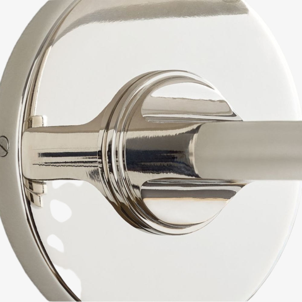 Close view of the polished round wall plate