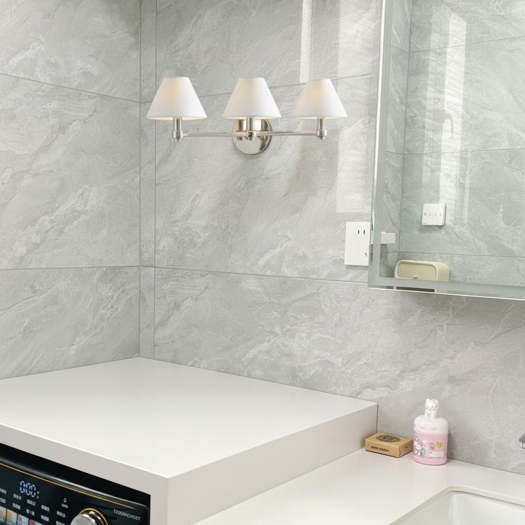 Customer bathroom using three light Roven wall sconce