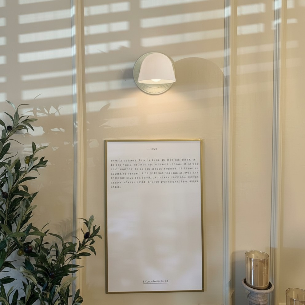 Customer room photo with Fiesta wall sconce near artwork