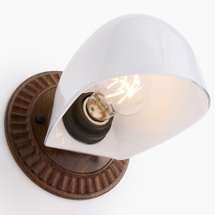 Close view of brass finish and glass shade