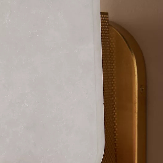 Close detail of the Albi sconce shade and frame