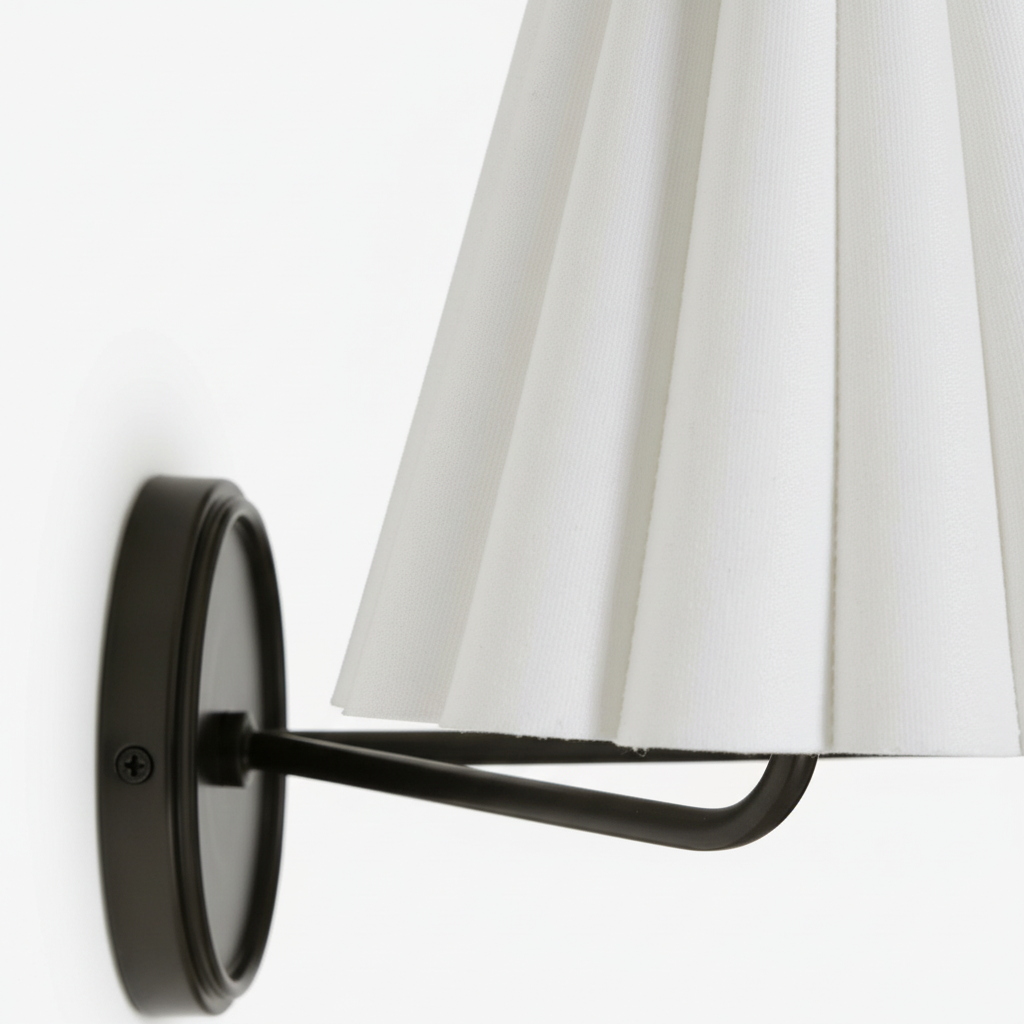 Close view of the black metal frame and pleated shade