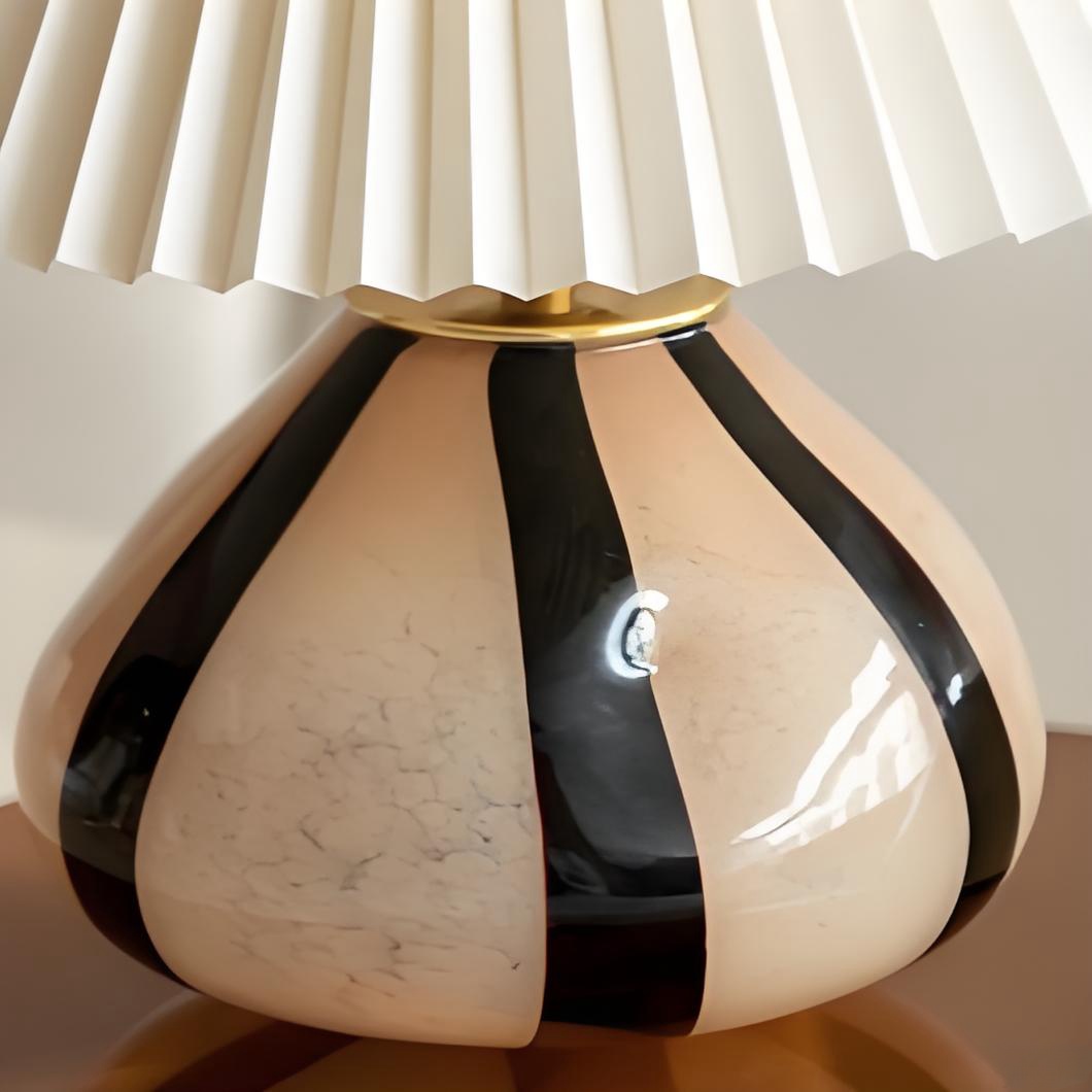 Close view of the striped glass lamp base