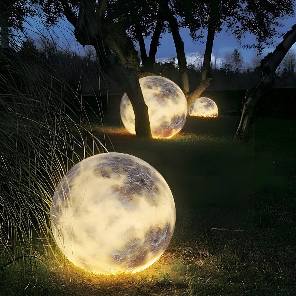 Moon lamp on lawn at night