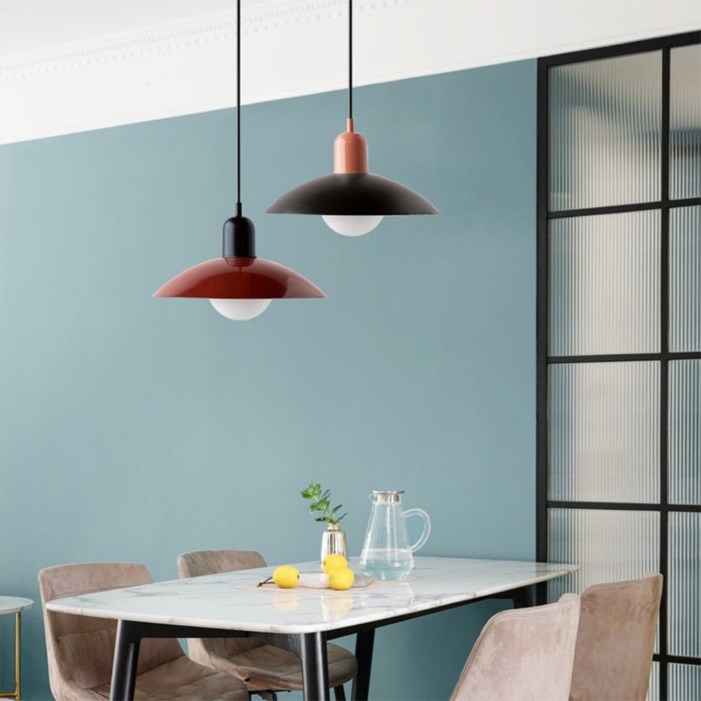 Macaron pendant lights above a dining table