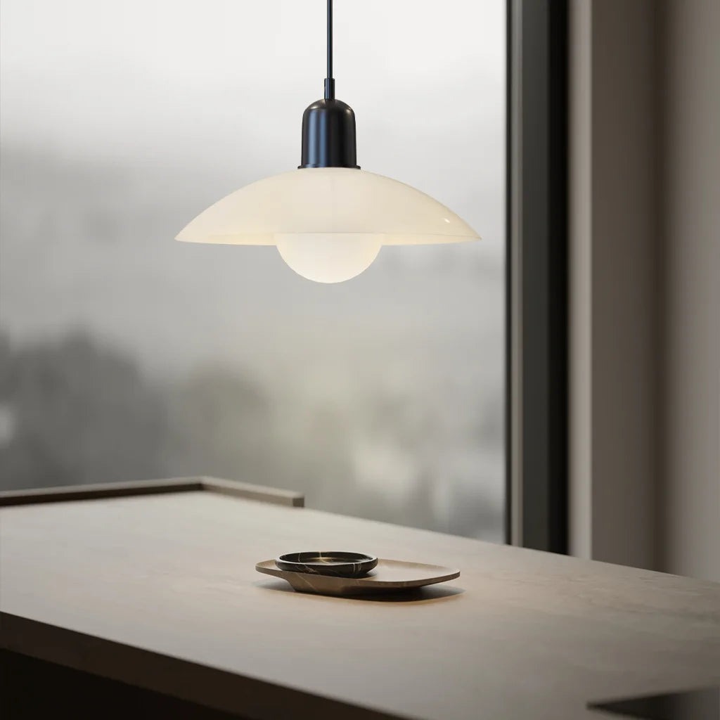 Cream Macaron pendant light near a window