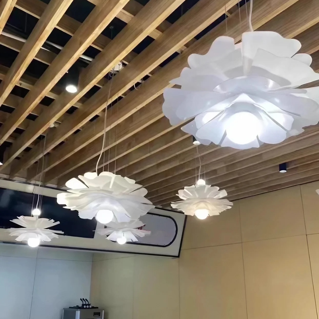 Multiple lotus lights in a ceiling setting