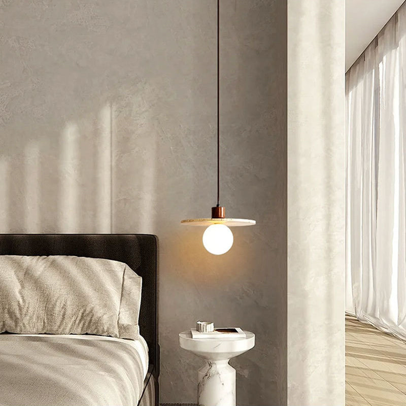 Pendant light by bed