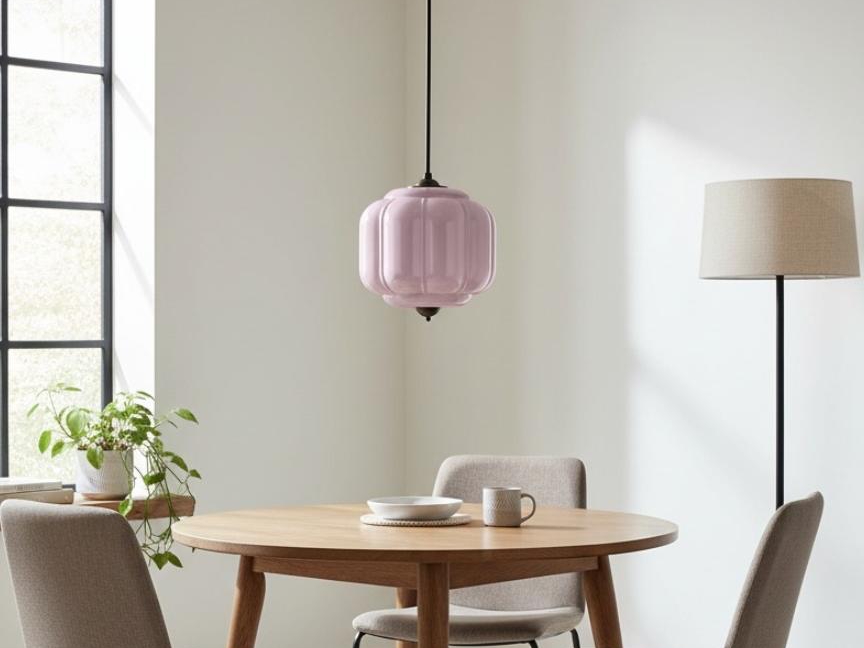 Pink glass pendant in dining room