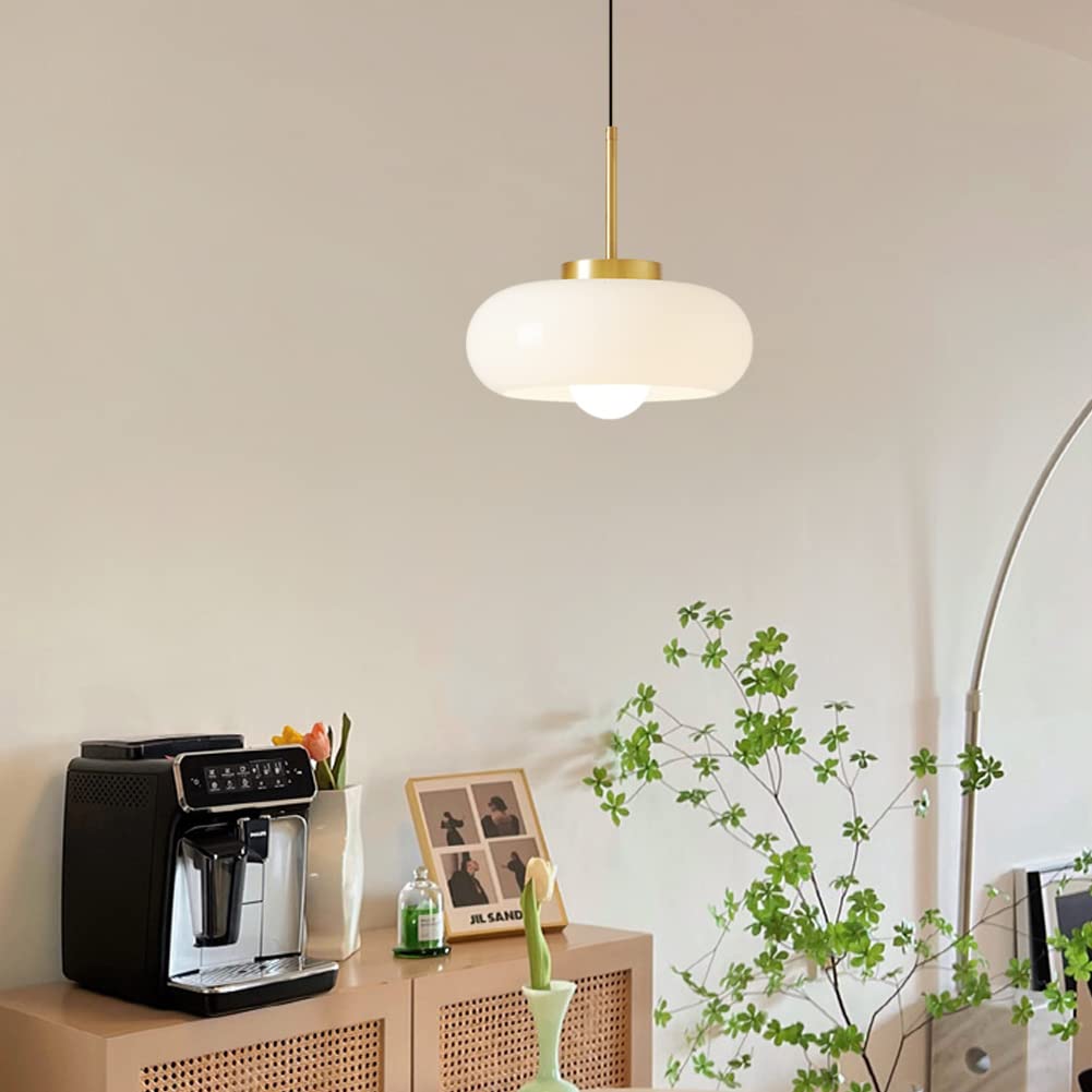 White milk glass pendant light installed in a home corner