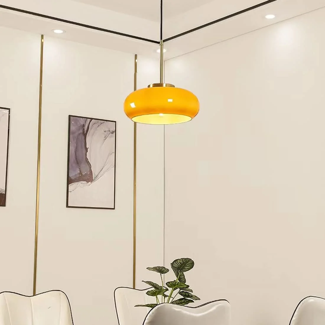 Orange globe pendant above a dining setting