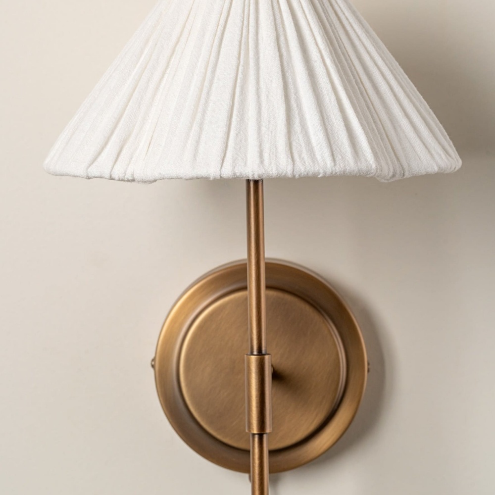 Pleated shade and brass stem detail