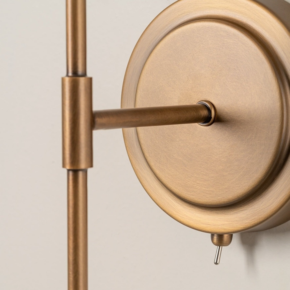 Aged brass wall plate detail