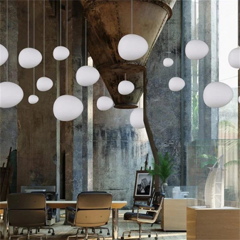 Interior with multiple milk glass pendant lights