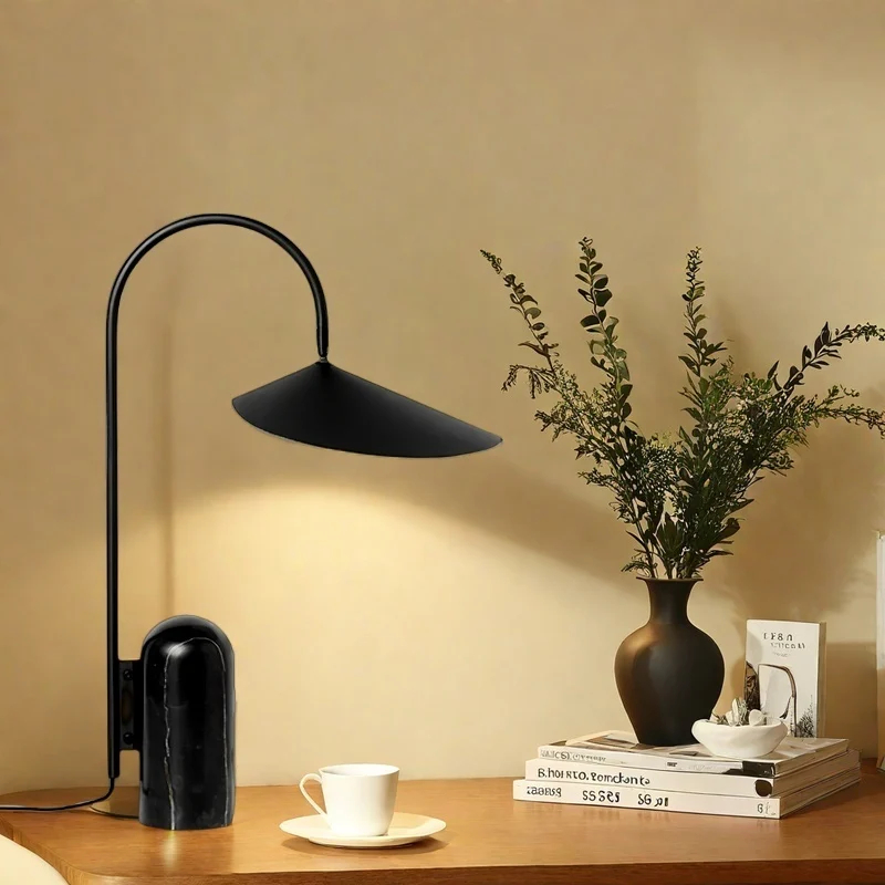 Black marble base table lamp lighting a warm tabletop