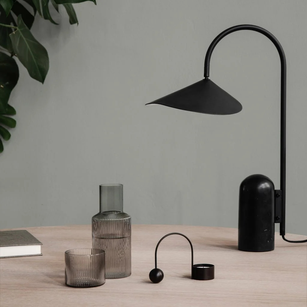 Black table lamp styled on a desk