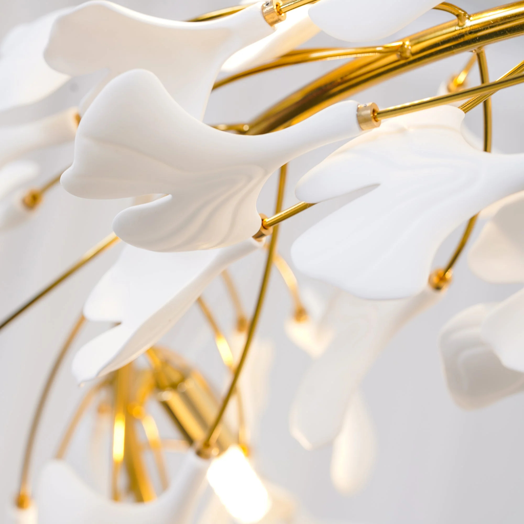 Porcelain leaf and gold frame detail of Gingko U Chandelier