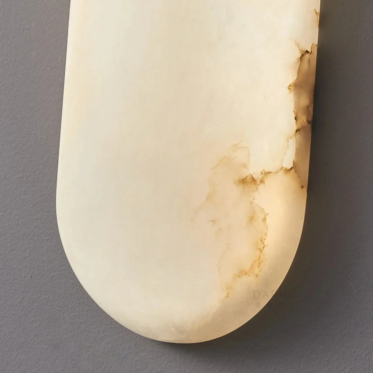 Rounded alabaster end detail