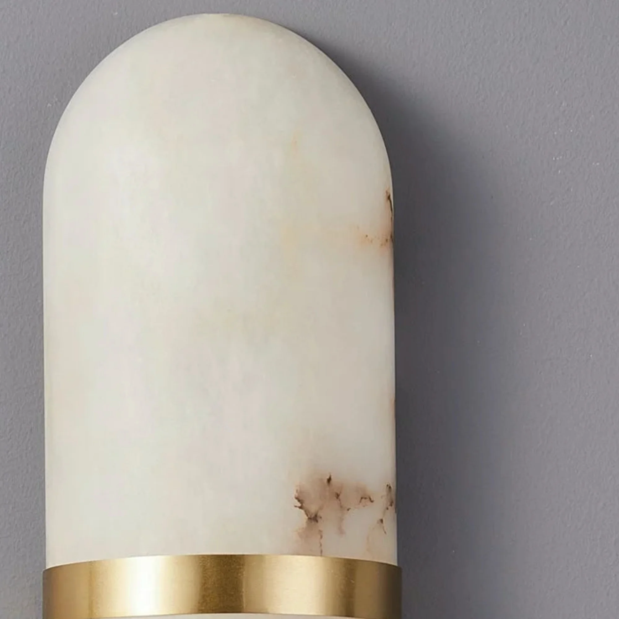 Alabaster pill shade and metal accent detail