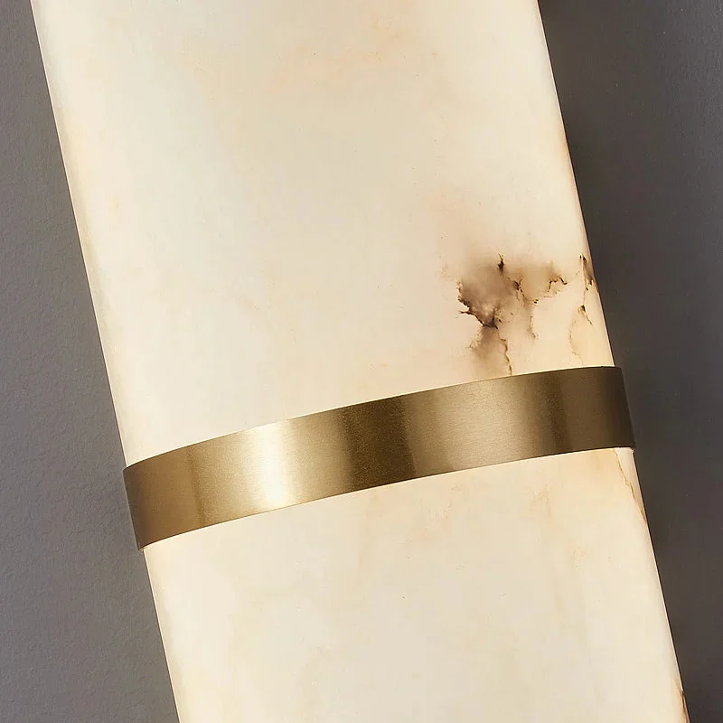 Close detail of alabaster shade with brass band
