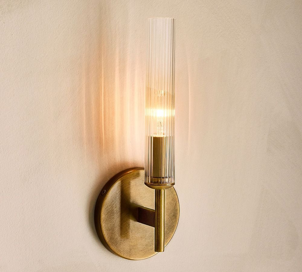 Tumbled brass single tube wall light finish