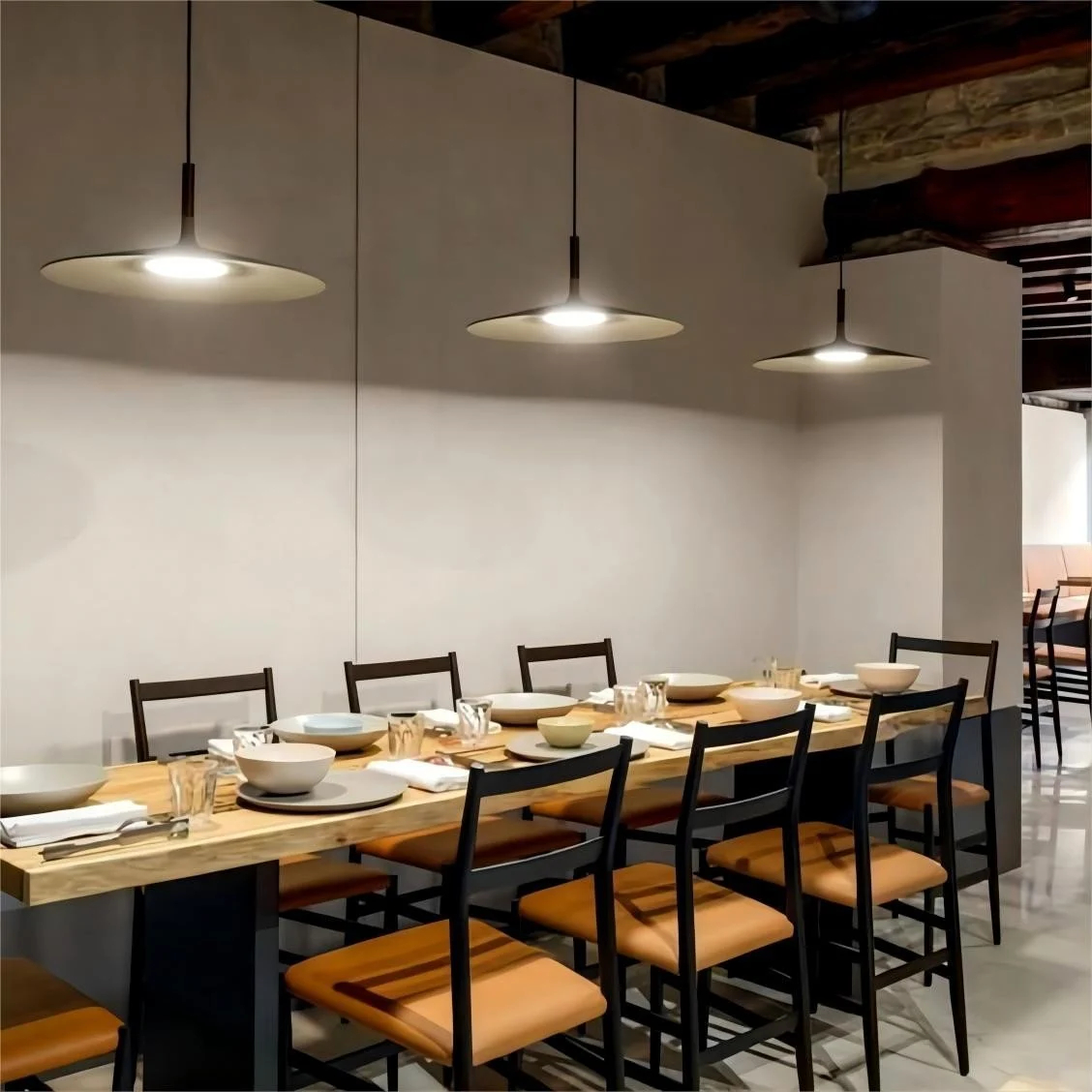 Large Disc Industrial Pendant Light in a dining setting