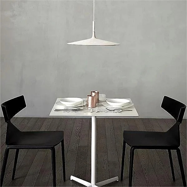 Large Disc Industrial Pendant Light above a small dining table