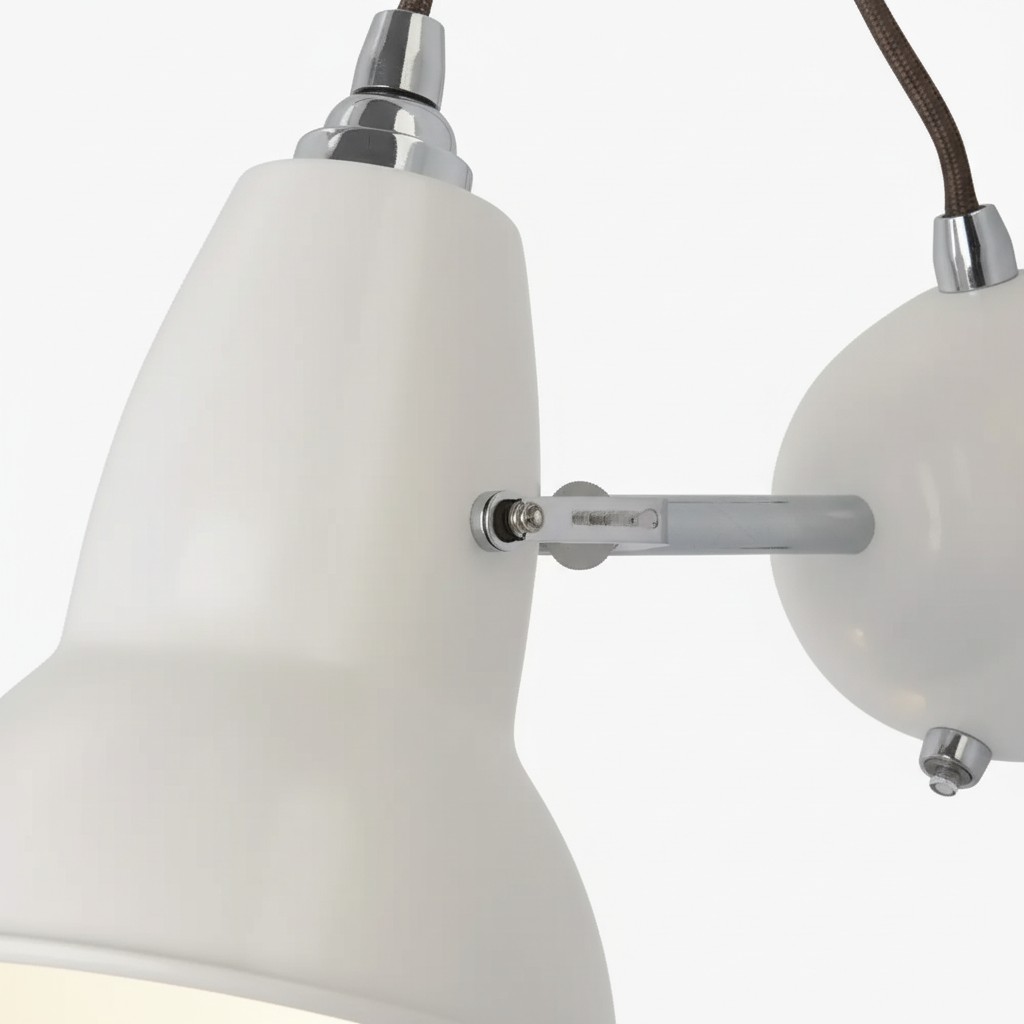 White wall light shade and metal wall base detail