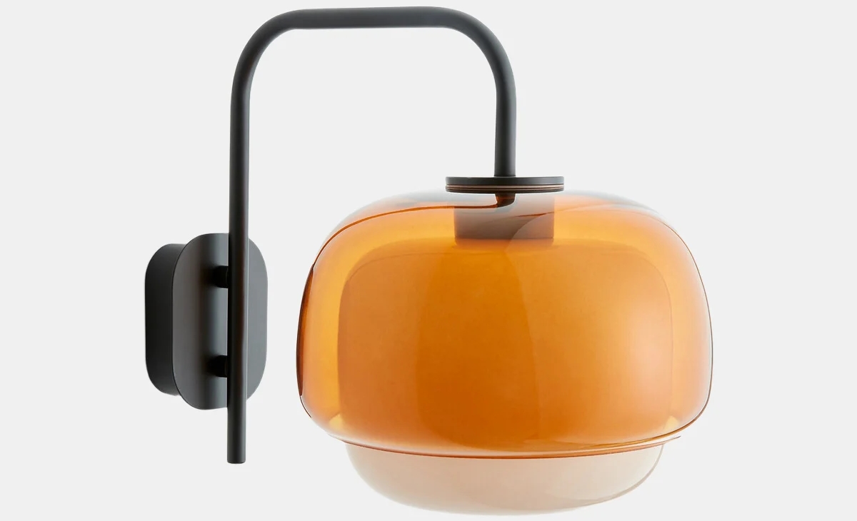 Dark orange glass wall lamp with black structure