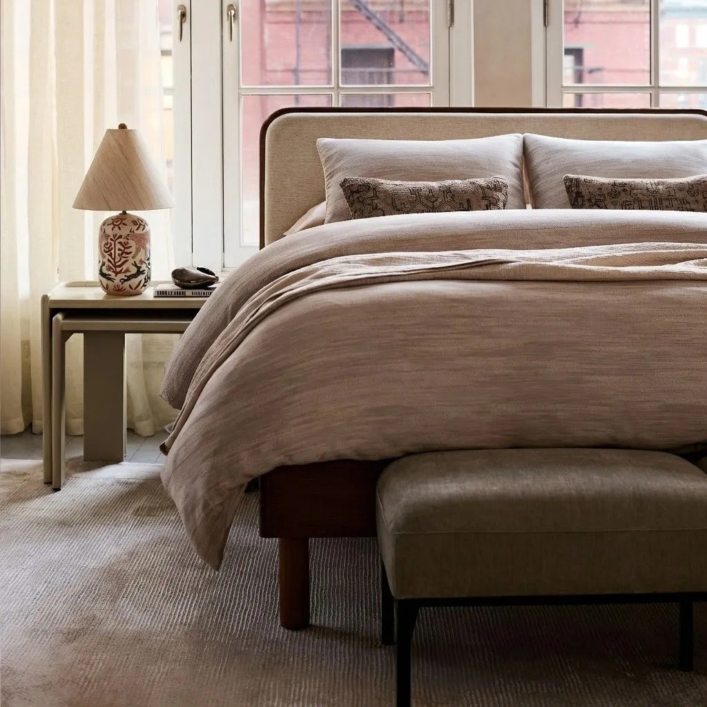 Ceruna table lamp in a soft bedroom setting