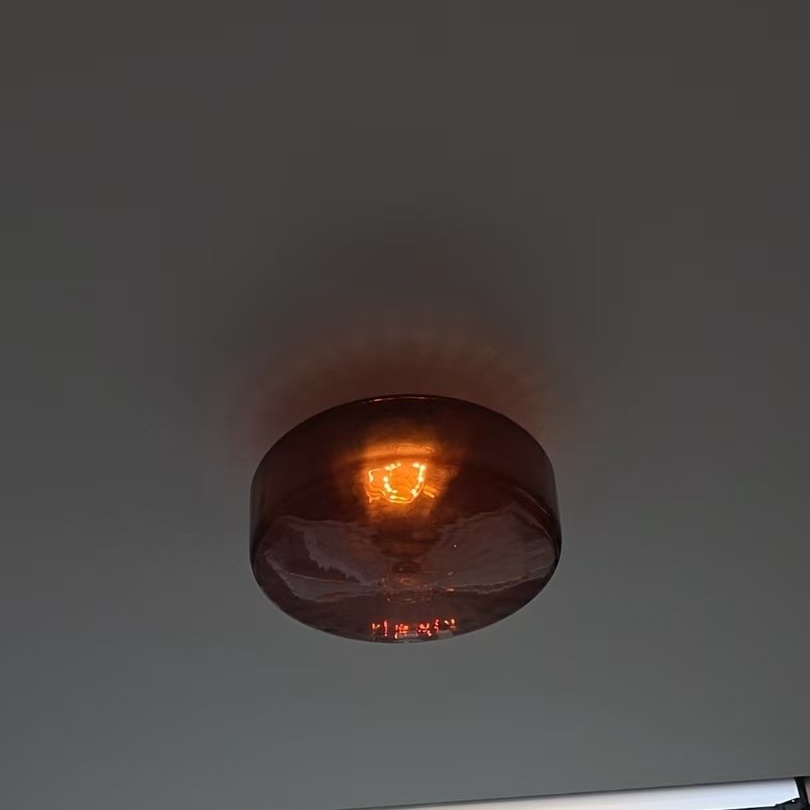 Customer photo of Ripplara brown ceiling light