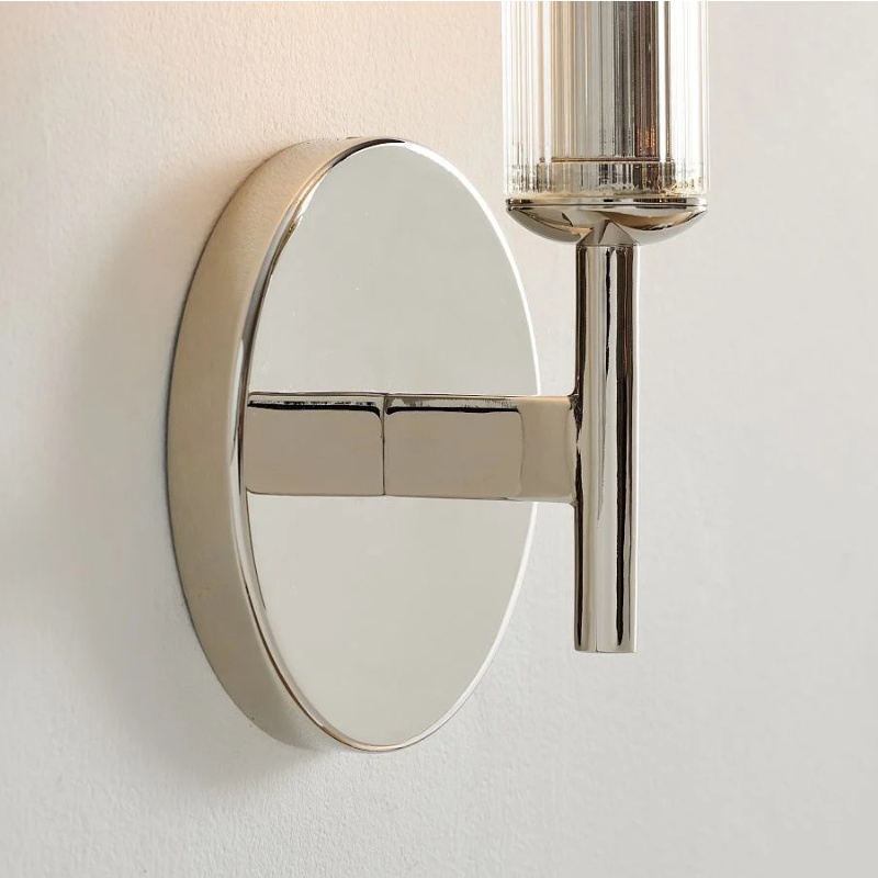 Round backplate and ribbed glass wall light detail