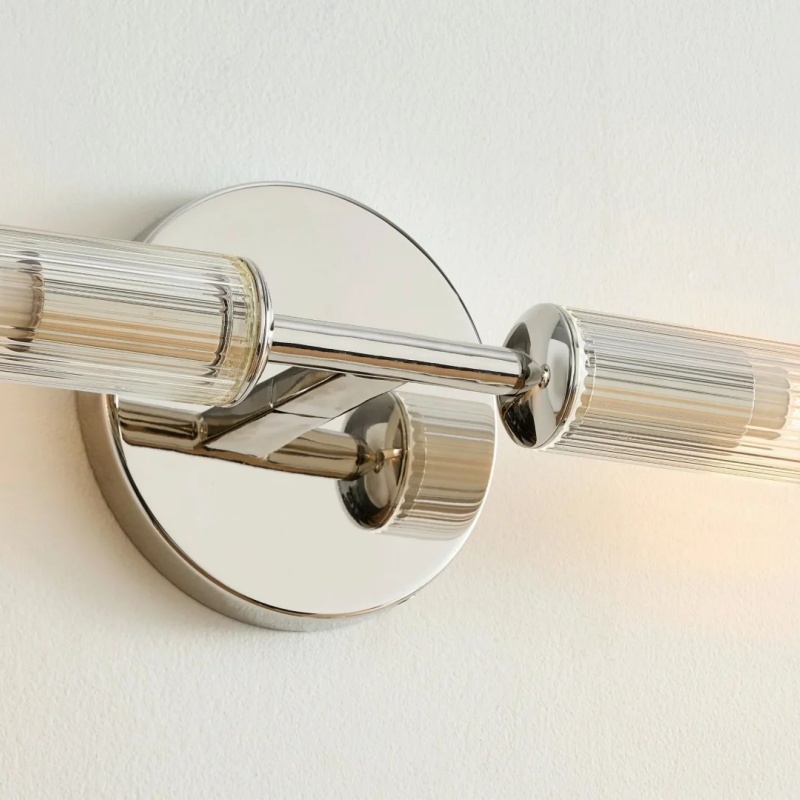 Chrome ribbed glass wall sconce detail