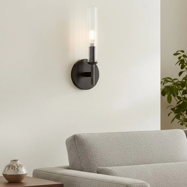 Bravira wall light installed above a sofa